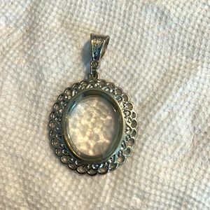 Stunning silver tone pendant with extra large clear bevel cut glass